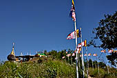 Myanmar - Kyaikhtiyo, several other stupas and shrines scattered on the ridge at the top of mount. 